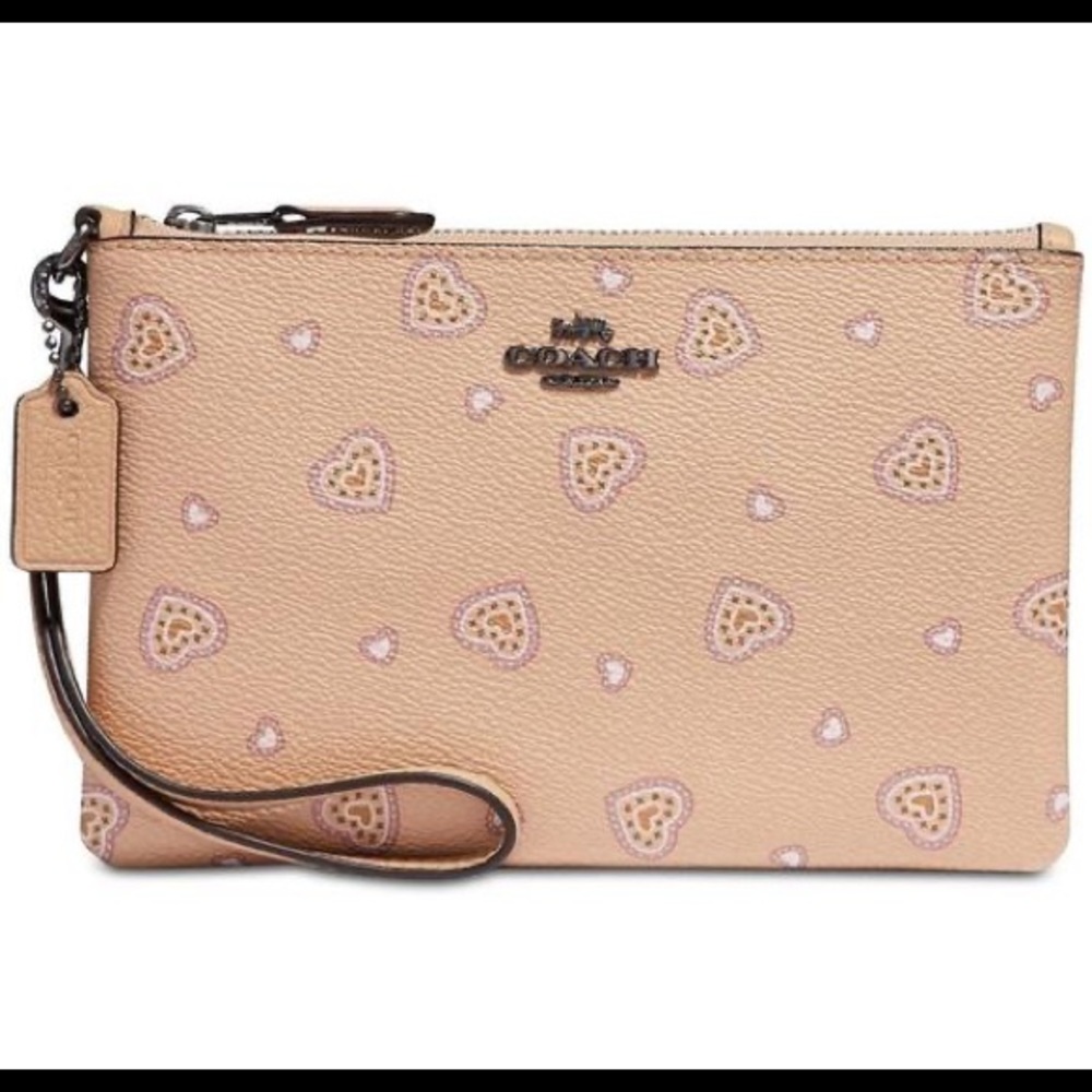 NWT Coach Large western hearts peach colored wristlet!!